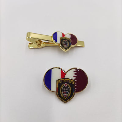 ซื้อ Custom Tournament Security Force Badge – Premium Heart-Shaped Dual Flag Enamel Pin and Tie Clip Set การผลิตออนไลน์